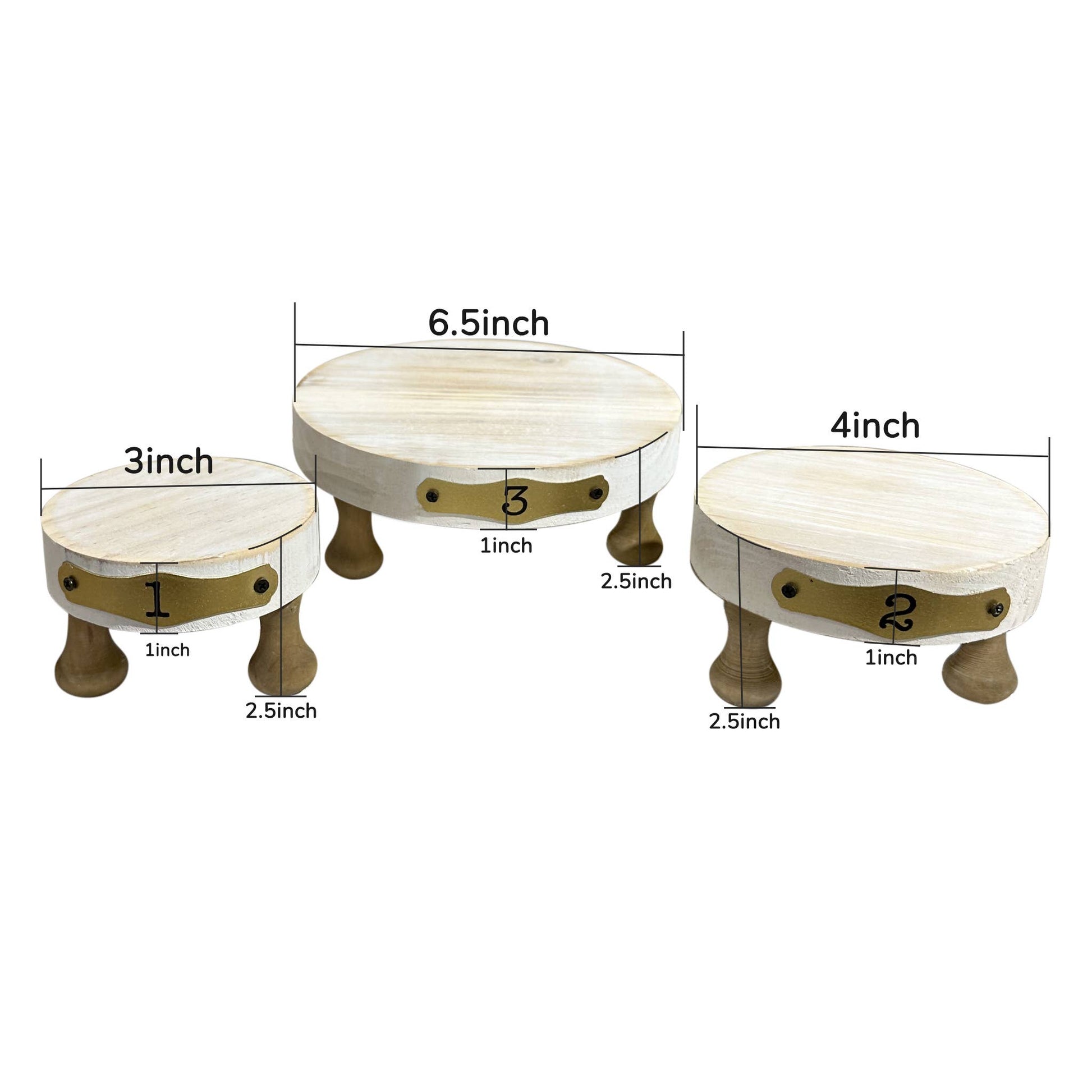 Dimensional reference of three white wooden display risers in different sizes, featuring brass number plates and sturdy legs for versatile use.