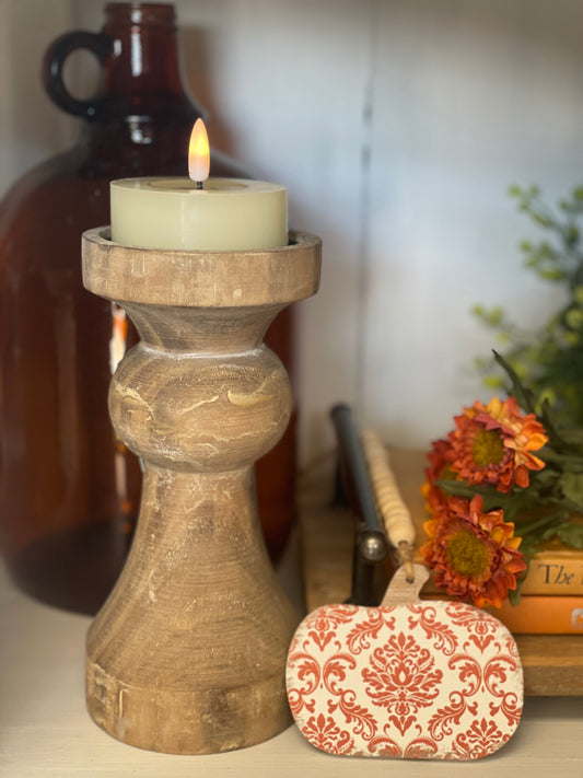 7.75" Everly Candle Holder with rustic wood finish, featuring elegant curves. Perfect for enhancing home decor and creating a warm ambiance.