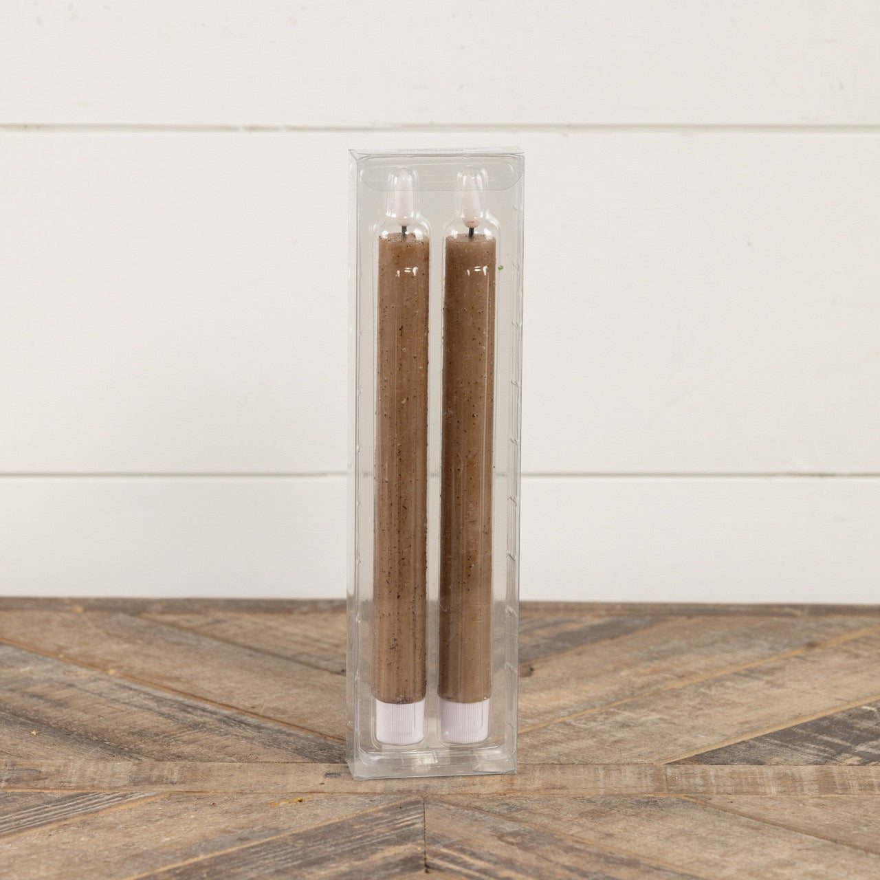 Packaged set of two 9.5-inch beige taper candles with a 3D flame effect. A stylish and safe alternative to traditional candles for home decor.
