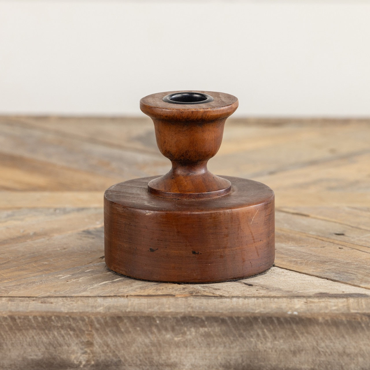 MENTOR TAPER CANDLESTICK made of polished wood with a smooth finish, featuring a classic design. Perfect for holding taper candles and enhancing home decor.