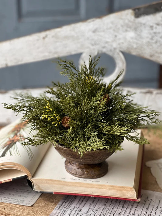 Alpine Cedar Half Sphere with mixed cedar greenery and pine cones in a rustic bowl. Perfect artificial flora decor for home and garden spaces.