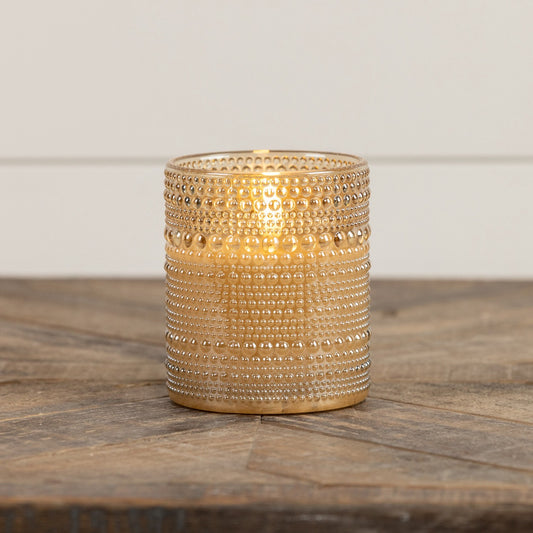 Champagne Dotted Glass 3D Flame Candle with intricate beaded texture, emitting a warm glow. Elegant flameless candle for home decor.