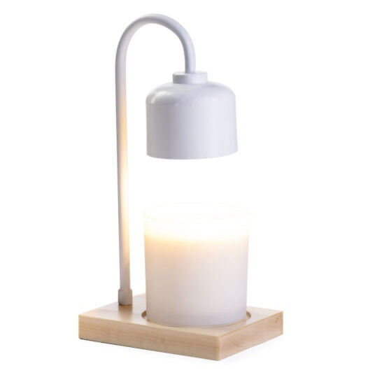 White & Wood Arched Candle Warmer Lamp with a modern design, featuring a curved white metal arm and a wooden base, gently warming a candle.
