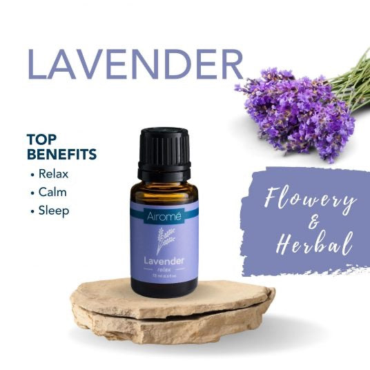 Lavender essential oil bottle displayed on a stone with fresh lavender flowers. Promotes relaxation, calmness, and better sleep for aromatherapy.
