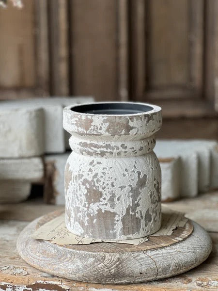 Lindhurst Pillar Holder 6 inch in distressed natural wood finish. Showcases rustic charm with a weathered look and a metal candle pan for stability.