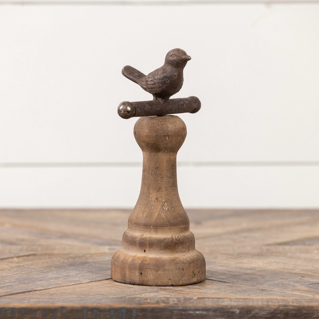 Single brown perching bird figurine on a wooden pedestal, ideal for farmhouse-style home and garden decor.