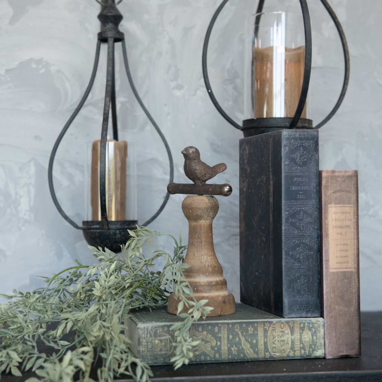 Rustic 7.75-inch brown perching bird figurine on a wooden pedestal, adding a charming nature-inspired touch to home decor.