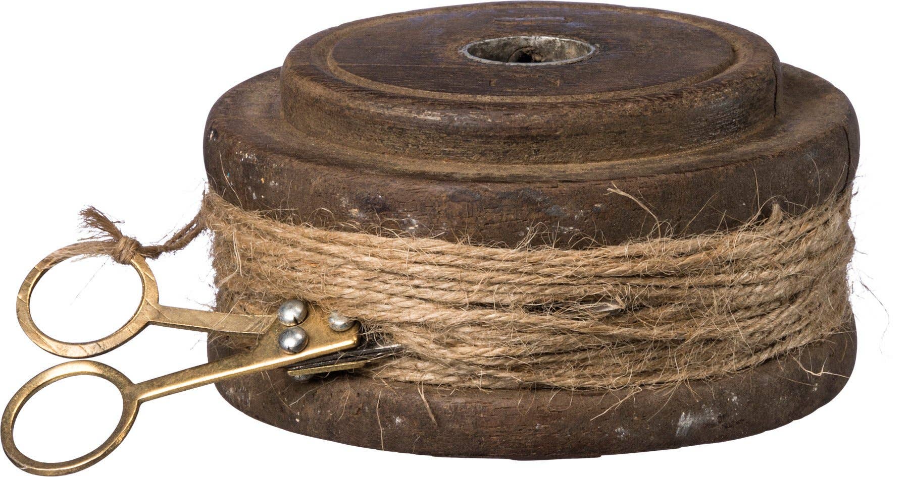 Flat twine spool with antique wooden base and rustic twine wrapped around, featuring vintage metal scissors. A unique home decor accent from India.