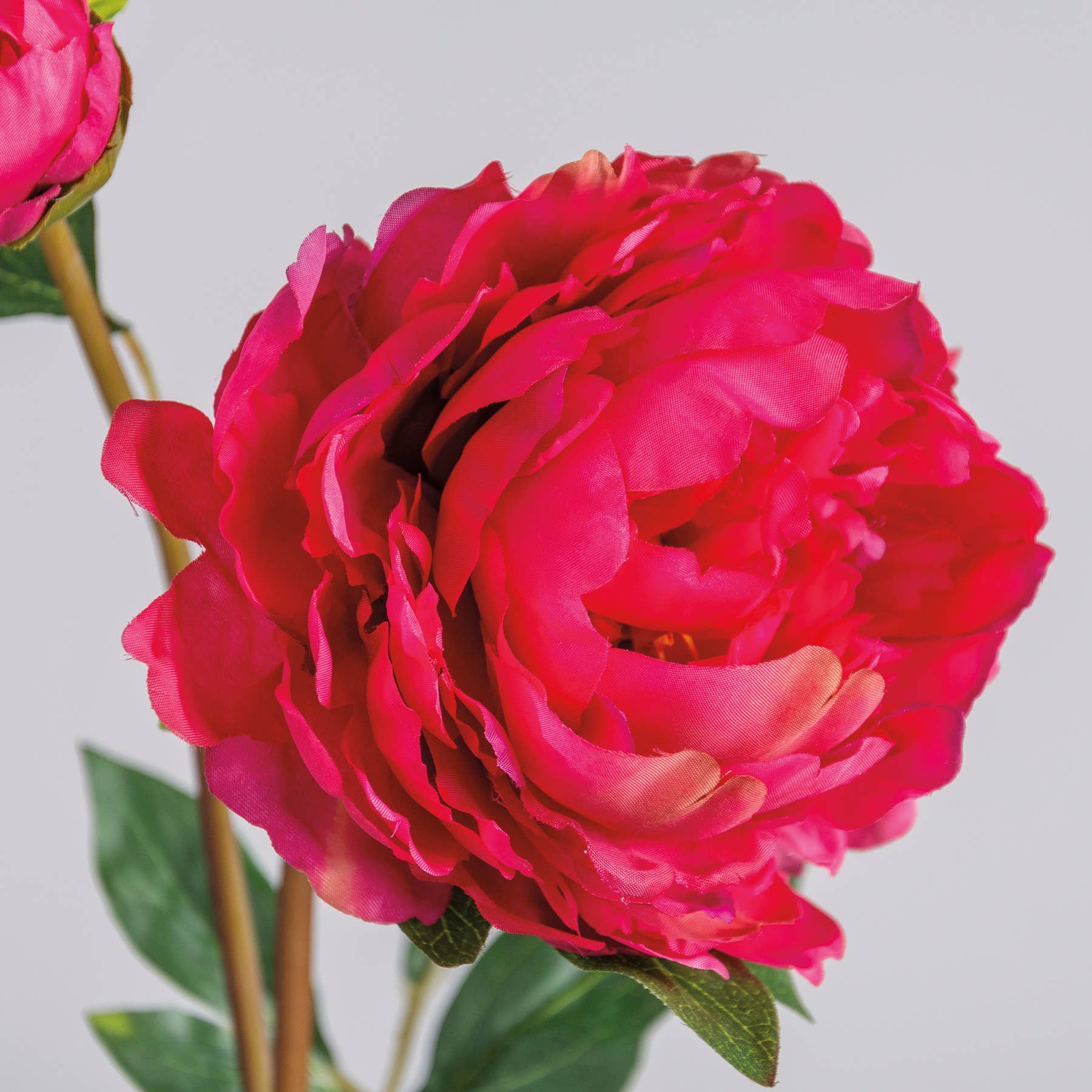 Close-up of dark pink peony floral pick showcasing delicate layered petals. A lifelike artificial flower for elegant home and garden decor.