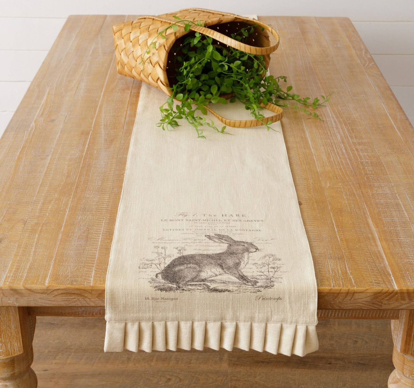 Reversible rabbit table runner featuring a vintage botanical hare with French script on a neutral cotton fabric. Perfect for Easter or spring decor.