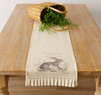 Reversible rabbit table runner featuring a vintage botanical hare with French script on a neutral cotton fabric. Perfect for Easter or spring decor.