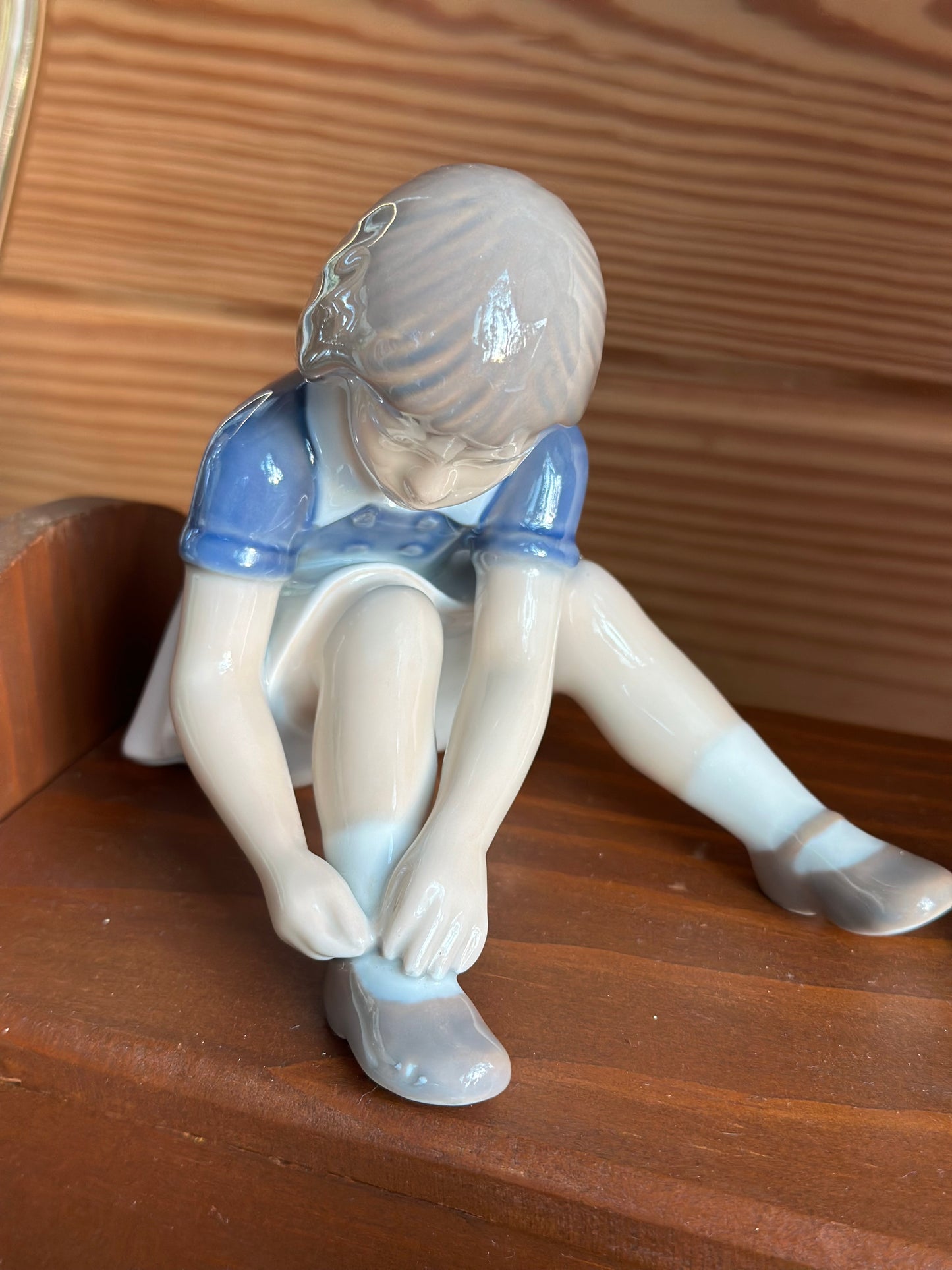 Vintage Figurine - Girl Buttoning Shoes