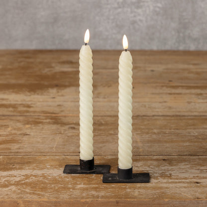 Pair of 3D Flame Twist Cream Taper Candles with a unique twisted design and lifelike flame effect. Ideal for stylish home and event decoration.