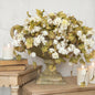 Elegant Cream Hops Stem arranged in a vintage urn, adding a cascading floral touch to home decor with soft candlelight ambiance.