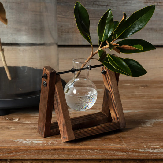 ROOTING VASE ON WOOD STAND